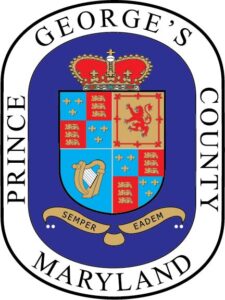 Prince George County Seal containts text "Prince" at the left side, "George's" at the top, " County" at the right side, and "Maryland" at the bottom part. Featuring the coat and arms with a crown, a lion and the words "semper eadem" in the middle.